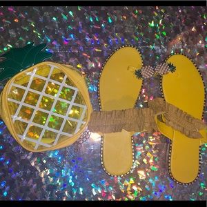 Pair of sandals with matching handbag